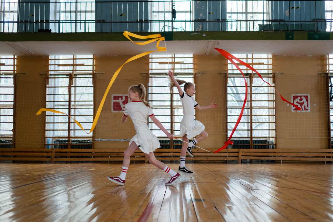Twins Doing Rhythmic Gymnastics